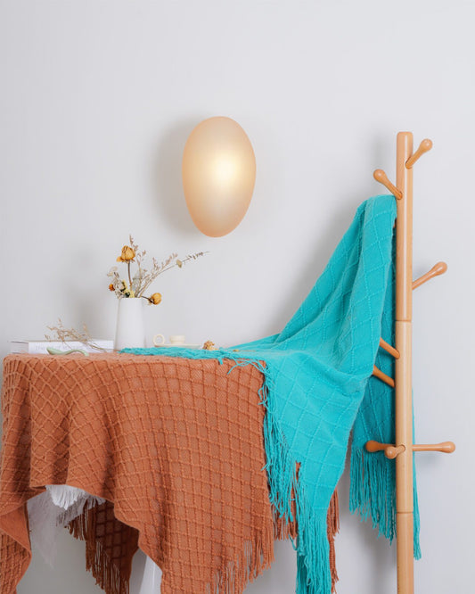 GLOW LUMINISCENT PEBBLE LED WALL SCONCE LIGHT