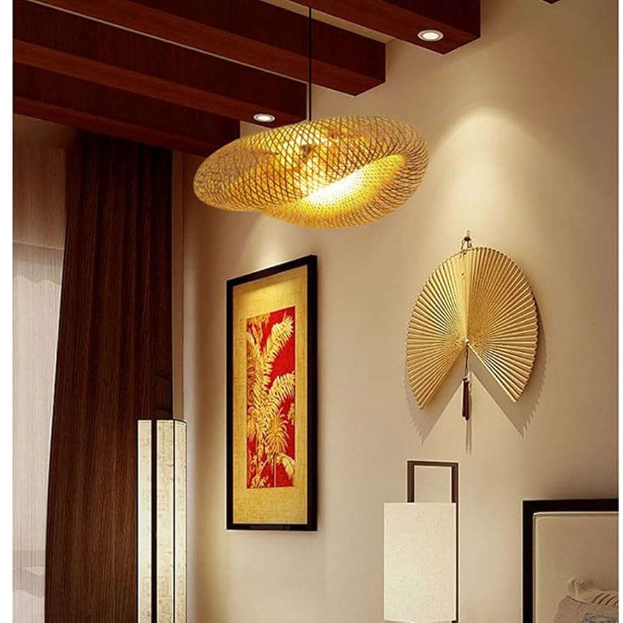 GLOW MOBIUS STRIP RATTAN PENDANT LIGHT and wall art in a room setting
