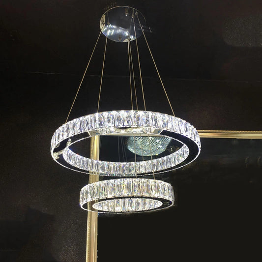 GLOW RINGS OF SATURN CRYSTAL CHANDELIER
